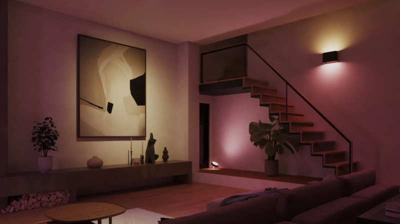 Philips Hue Dymera indoor and outdoor wall light illuminating a modern home