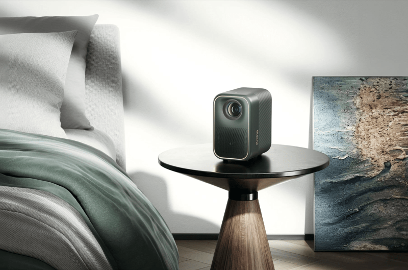 Formovie Xming Page One projector set up in a cozy bedroom