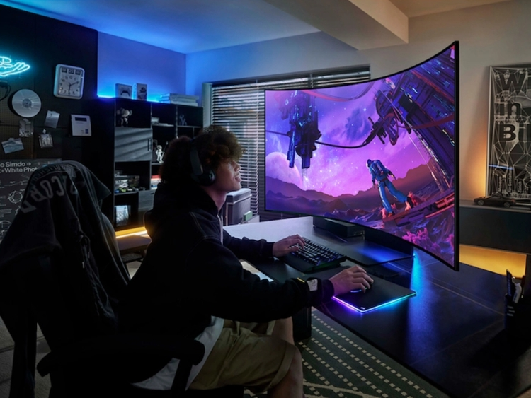 SAMSUNG 55-inch Odyssey Ark 4K monitor in a cozy bedroom setting