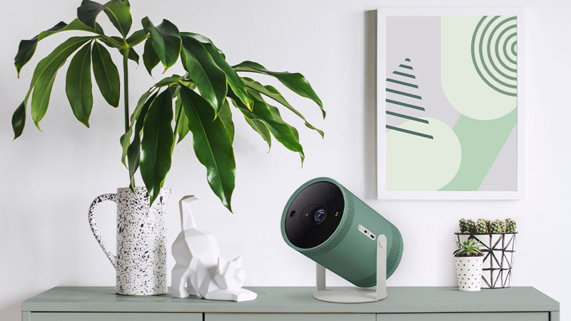 Green Samsung Freestyle projector in a modern living room