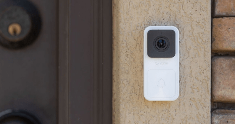 Roku Video Doorbell displayed against a contemporary home entrance, showcasing its modern design and compact form