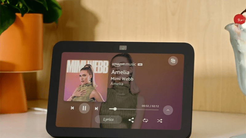 Echo Show 8 (3rd Gen) playing music in a living room setting.