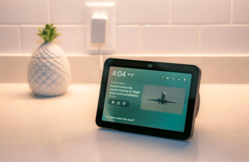 Echo Show 8 (3rd Gen) on kitchen counter with smart home devices.