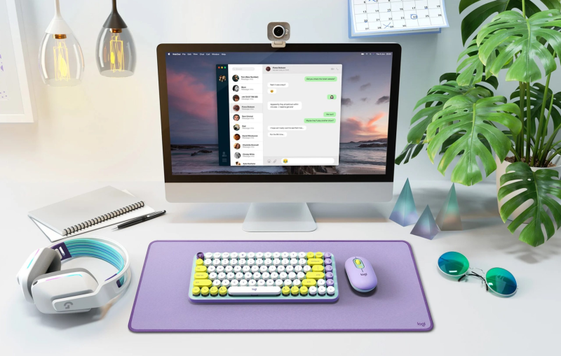 Logitech POP Keyboard in purple color on a modern office desk.