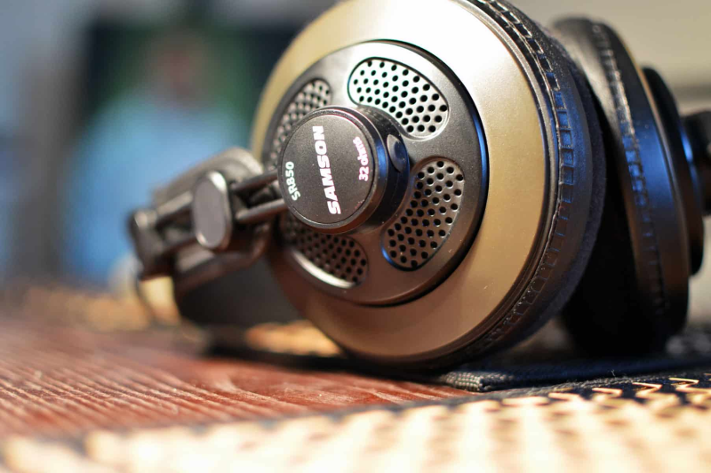 Close-up of Samson SR850 headphones showing sleek design and cushioned ear pads.