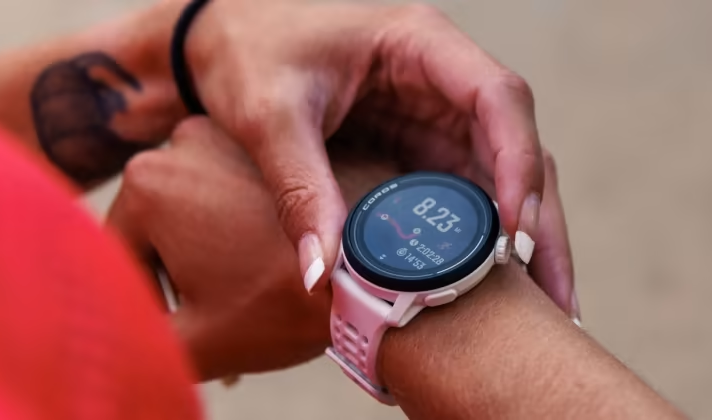 Female runner wearing the COROS PACE 3 GPS watch during a workout