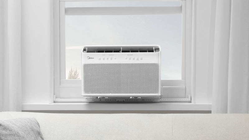 Front view of Midea U AC unit with control panel visible.