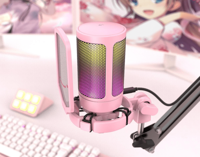 Pink FIFINE AmpliGame A6V microphone in a vibrant gaming setup.