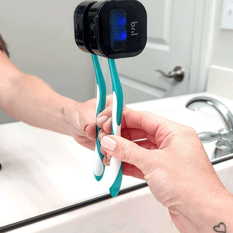 Bril UV-C toothbrush sanitizers fixed in a bathroom mirror