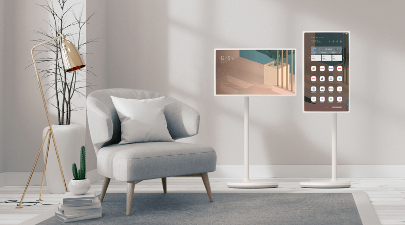 LG StanbyME Go displayed in a rack in a modern living room.