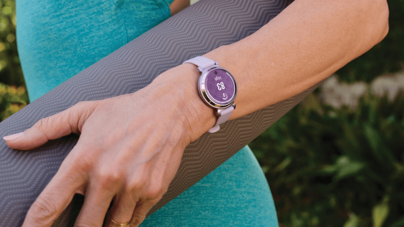 Garmin Lily 2 Active smartwatch displaying health tracking features like heart rate monitoring and Body Battery energy levels.