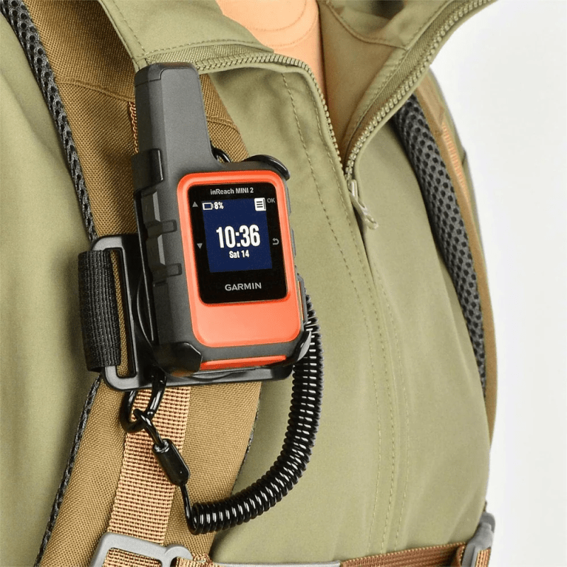 Garmin inReach Mini 2 in rugged outdoor terrain, showcasing its durable design