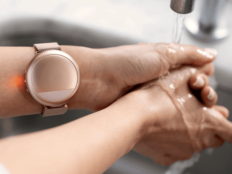 Close-up view of the Embr Wave 2 wristband, highlighting its metallic finish and ergonomic strap design.