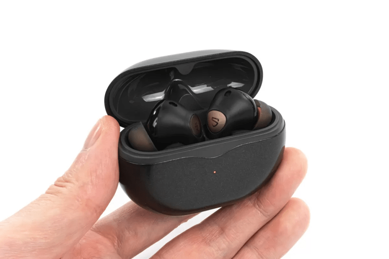 SoundPEATS Air4 Pro wireless earbuds with charging case on display.