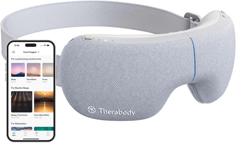 Therabody SmartGoggles next to a smartphone displaying the Therabody app’s relaxation and meditation options.
