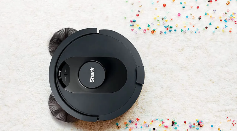 Close-up view of the Shark AV2501S vacuum’s brush roll and HEPA filter.